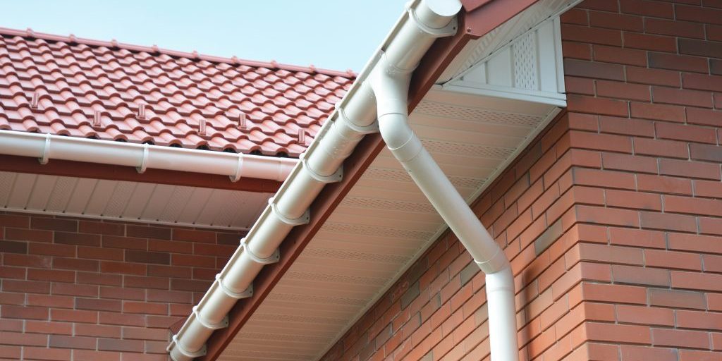 Close up view on House Problem Areas for Rain Gutter Waterproofing Outdoor. Home Guttering, Gutters, Plastic Guttering System, Guttering &amp; Drainage Pipe Exterior