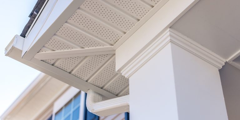Colonial white custom porch columns with wood looking vinyl column wrap, sheets and molding, white soffit provides optimal ventilation for roof overhangs Colonial white custom porch columns with wood looking vinyl column wrap, sheets and molding, white soffit provides optimal ventilation for roof overhangs